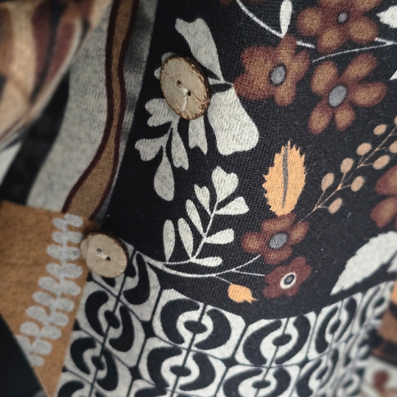 Long-sleeve, hooded asymmetrical zip-up jacket.  Patchwork design. - Picture 3 of 8